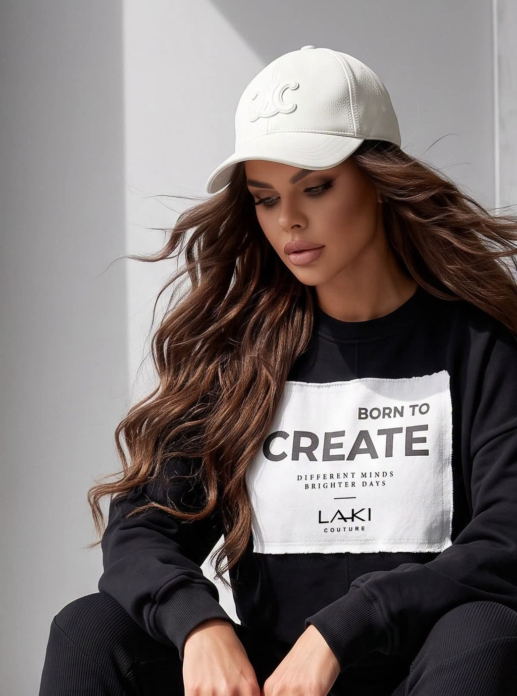 LAKI Couture Sweatshirt „Born to Create" – Gesamtansicht mit Statement-Patch