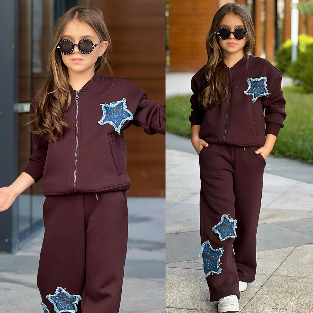 Mädchen trägt dunkelbraunen Super-Star-Trainingsanzug mit Denim-Sternen, Zip-Jacke und weiter Hose.